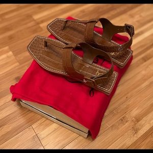 Brand New (Never Been Worn) Brown Christian Louboutin sandal.